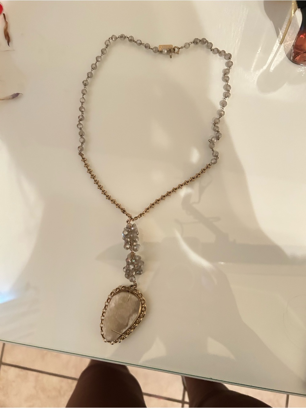 Gold-Tone Necklace with Cream Stone Pendant and Gray Beads